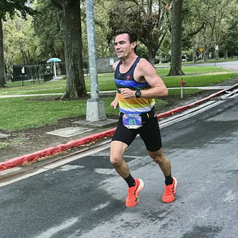Brandon Costa running in a road race.